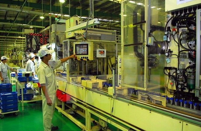 A motorised vehicle spare part production line at the Nissin Manufacturing Vietnam Company. (Source: Danang)
